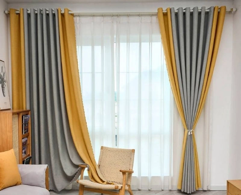 Yellow and grey eyelet curtains for modern windows.