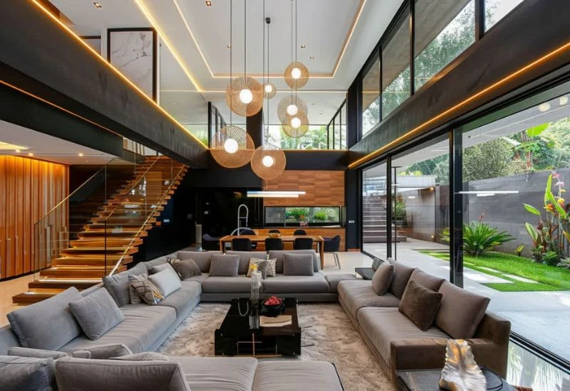 Modern living room renovation with Burj Khalifa view.