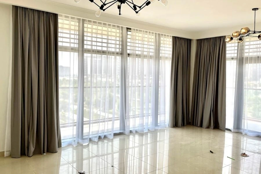 Luxury floor to ceiling curtains for large windows.