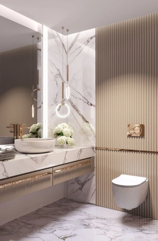 Luxury marble bathroom with modern ring pendant lights.