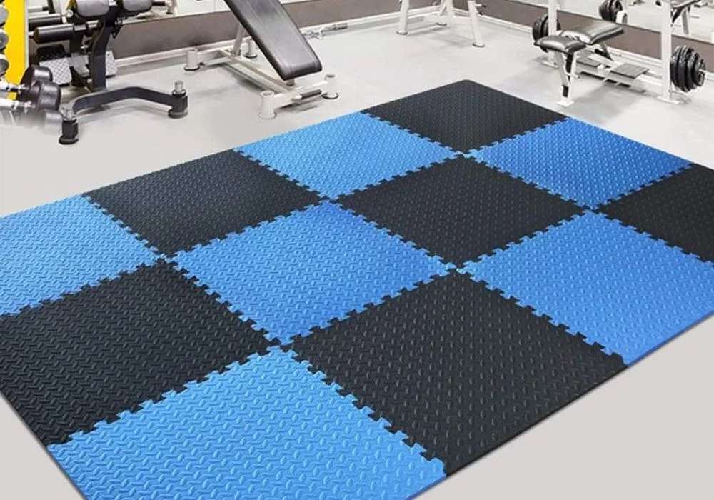Shock-absorbent interlocking gym mats for workout areas.