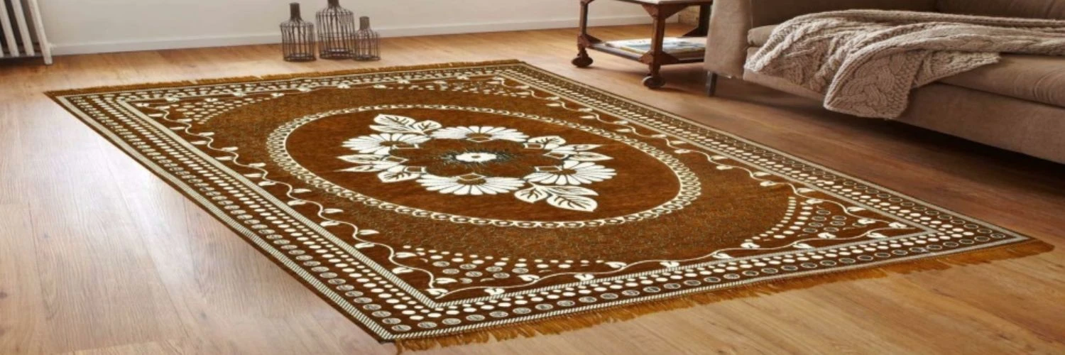 Traditional brown velvet rug with white floral patterns on a wooden floor.