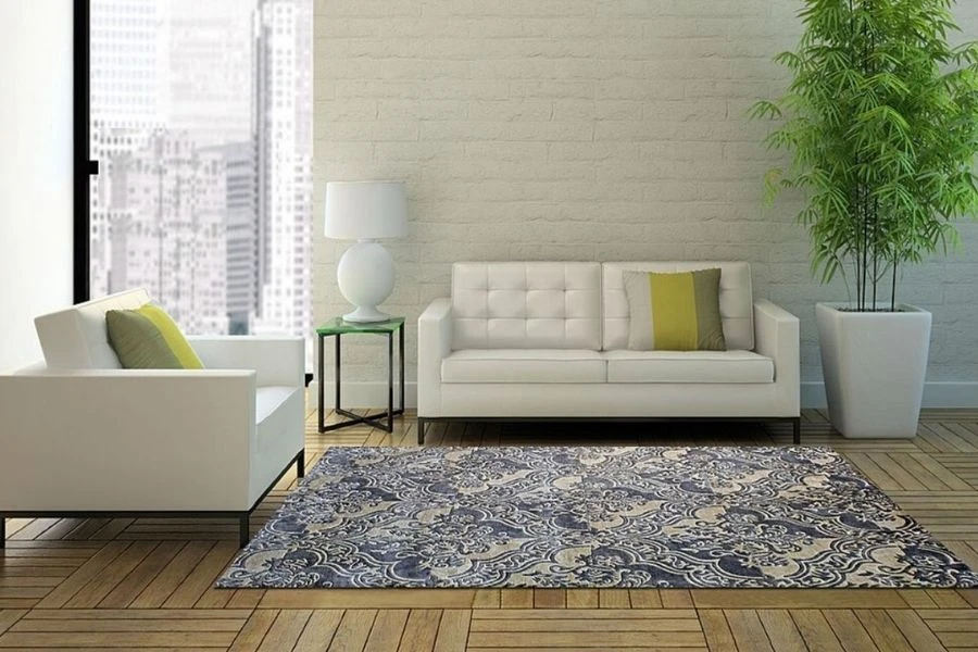 Modern blue and beige damask pattern rug in living room.
