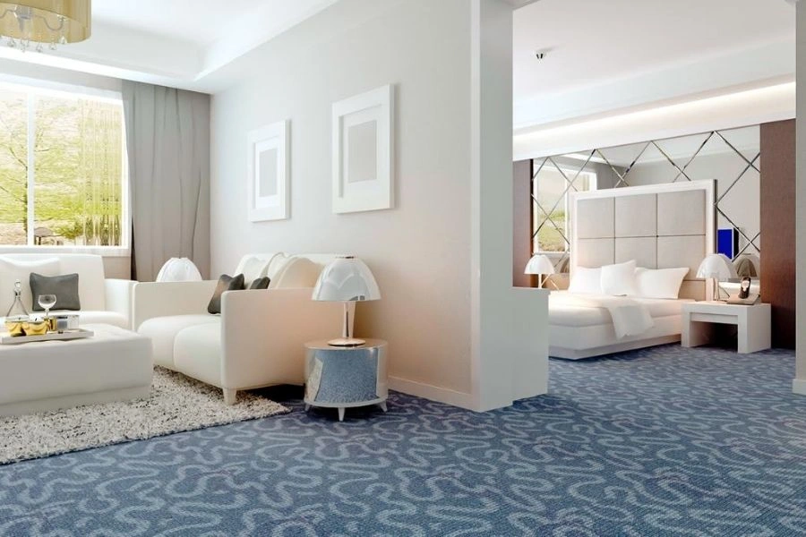 Luxury blue patterned carpet in modern Dubai bedroom.