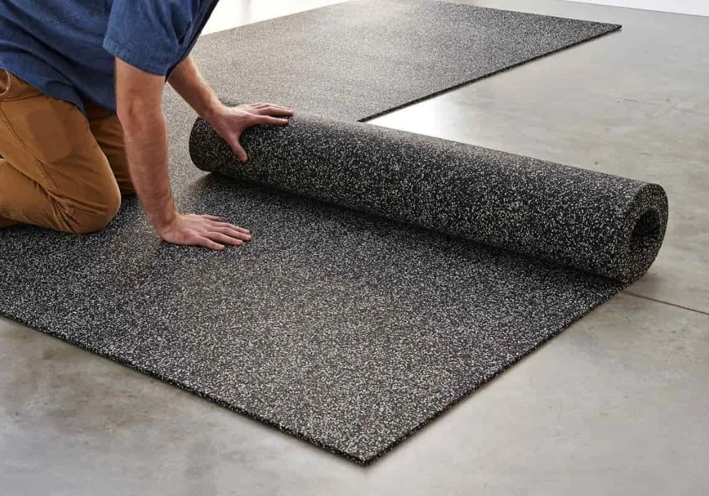 Durable black rubber floor mats for industrial use.