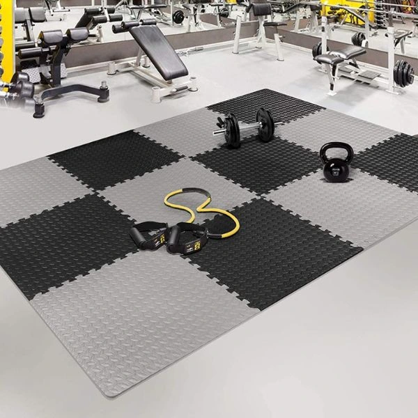 Interlocking rubber gym mats for high-impact workouts.