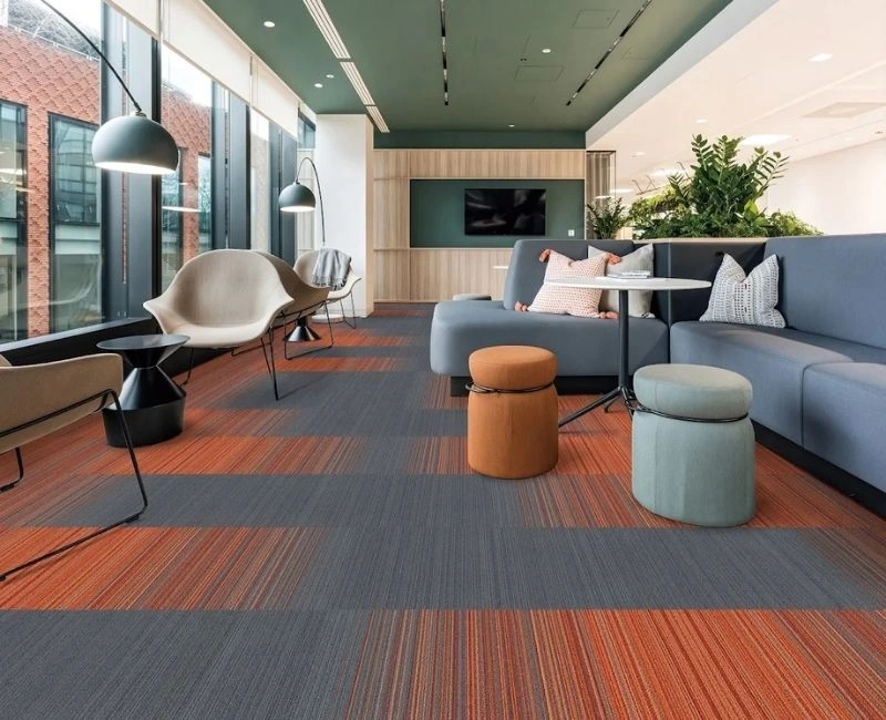 Modern commercial carpet tiles in Dubai office space.