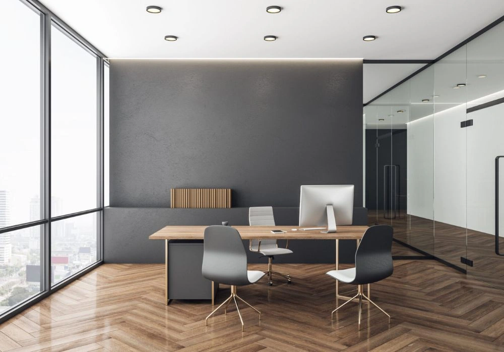 Modern office workspace being painted by professional painters.