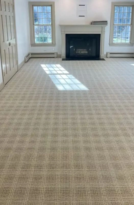 Modern checkered pattern carpet in Dubai living room.