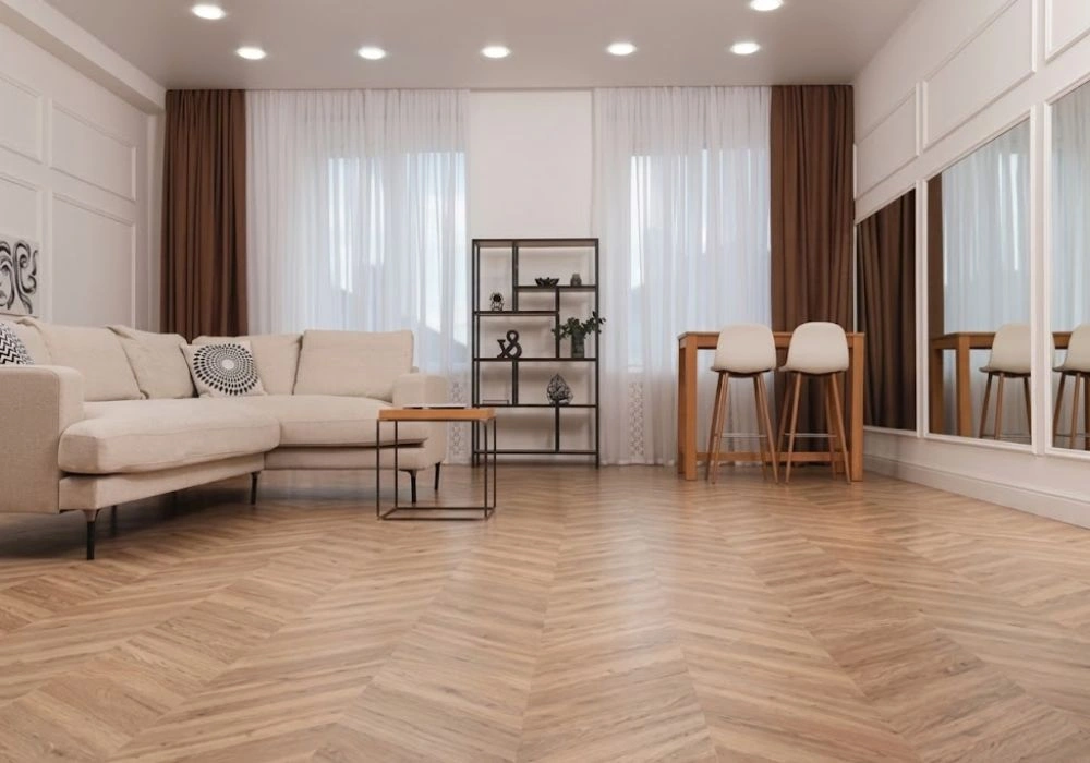 Modern lounge room with chevron parquet floor