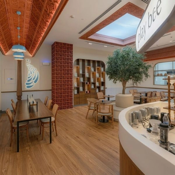 Commercial cafe dining with wooden kitchen flooring