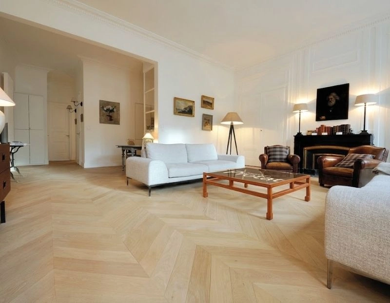 Elegant villa lounge with chevron parquet flooring