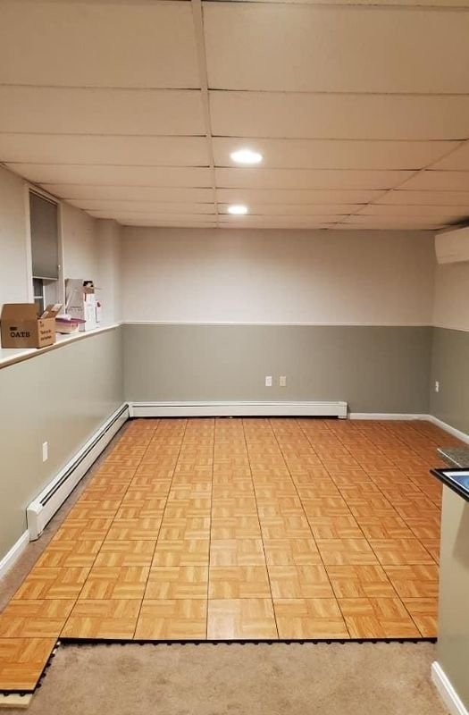 Modular parquet interlocking tiles for basement flooring