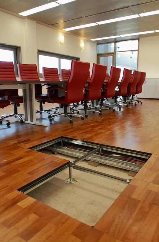 Raised floor system for office conference rooms