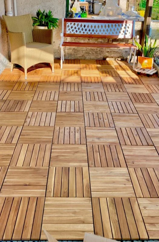 Cozy patio setup with teak deck tiles