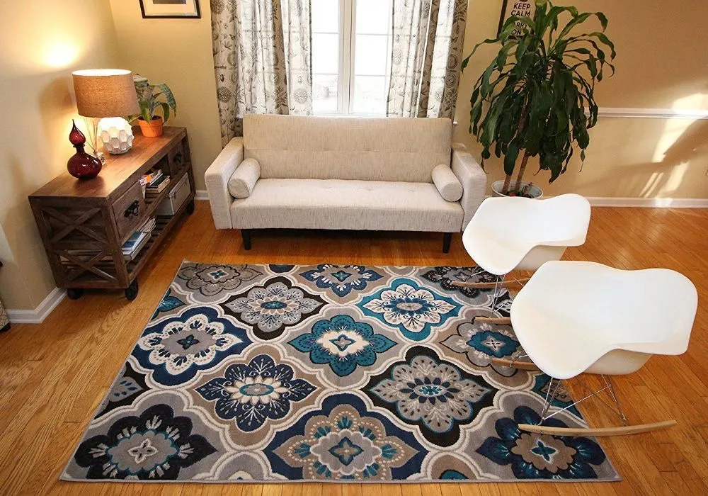 Blue floral patterned area rug