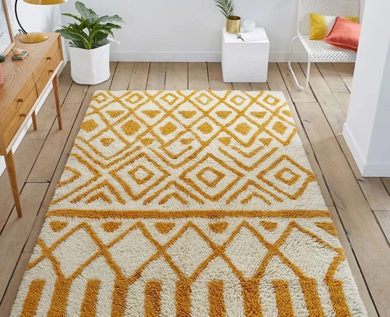 Yellow and white bohemian area rug