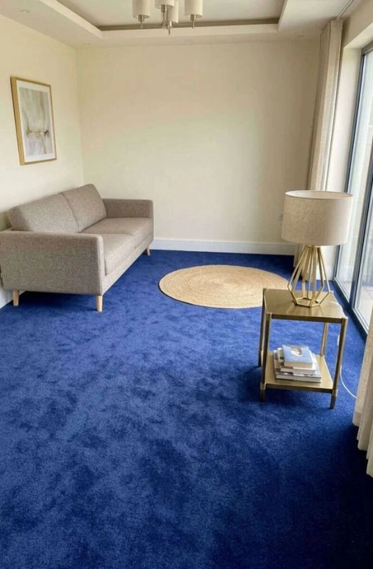 Royal blue wool carpet in Dubai lounge