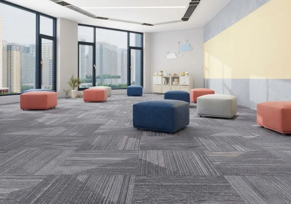 Grey textured modular carpet tiles seating area