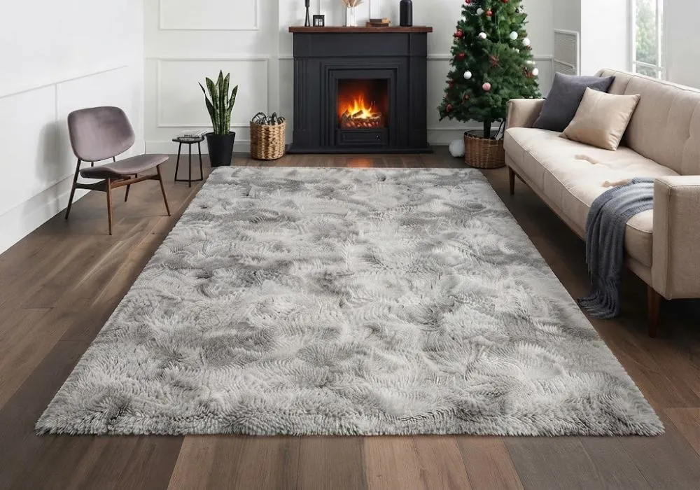 Grey shaggy rug by fireplace in Dubai villa.