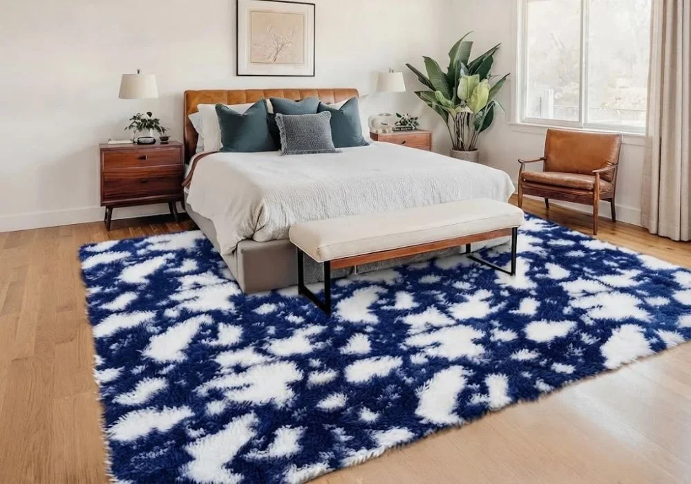 Blue and white shaggy rug in Dubai bedroom.