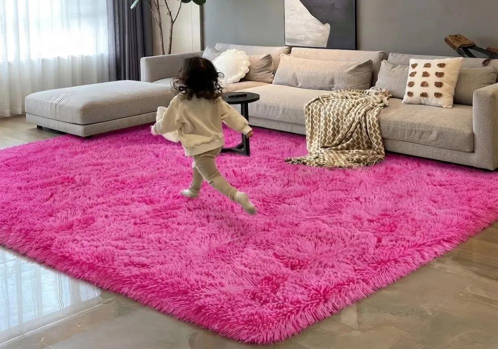 Bright pink shaggy rug in family living room Dubai.
